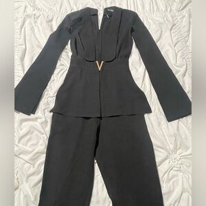 PrettyLittleThing Black Long Sleeve Jumpsuit